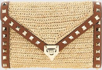 Valentino Garavani Pochette Rockstud in rafia e pelle