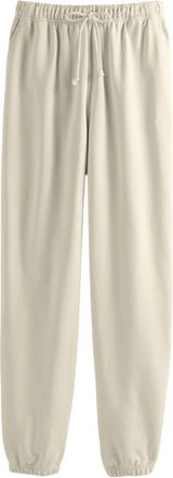 New Balance Athletics French Terry Jogger - Dames - Trainingsbroeken - Beige - S - Katoen - Fitness