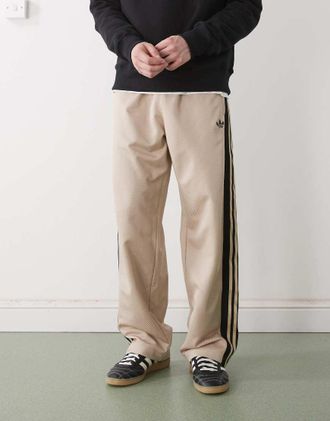 adidas Originals Pantaloni sportivi ampi in rete color kaki pietra-Neutro