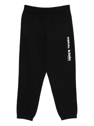 Calvin Klein logo-print track pants - men - Cotton/Polyester - L - Black