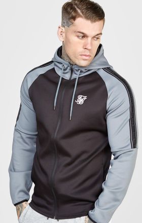 Siksilk Gray grabada zip a trav&eacute;s de la parte superior de la pista S