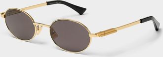 Bottega Veneta Golden oval sunglasses
