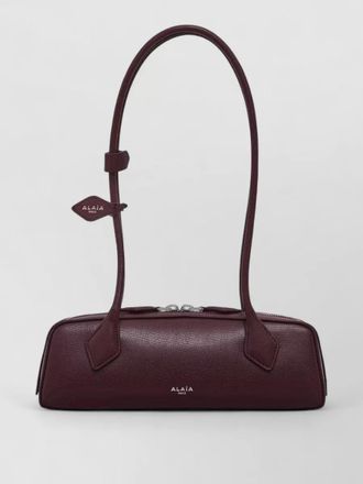Alaia small leather shoulder bag long handles