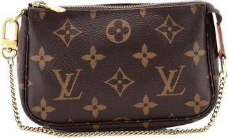 Louis Vuitton Pochette Accessoires Monogram Canvas Mini clutch bag - Bruin