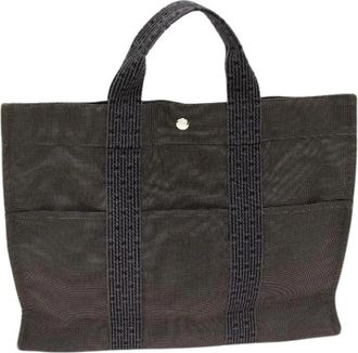 Herm&egrave;s Pre-owned Herline Canvas Tote MM - Dames - Vintage Shopper - Grijs - ONE Size - Vintage