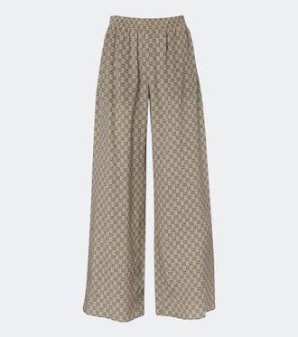Gucci Pantalones palazzo de crep&eacute; de seda con GG