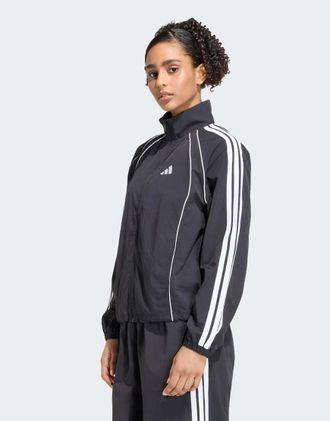 adidas Iconic - Top sportivo nero e bianco con 3 strisce