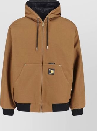 Carhartt Work in Progress versatile hooded jacket featuring pockets