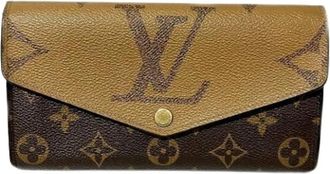 Louis Vuitton Pre-owned Long wallet (bi-fold) - Dames - Vintage Accessoires - Bruin - ONE Size - Leer - Vintage